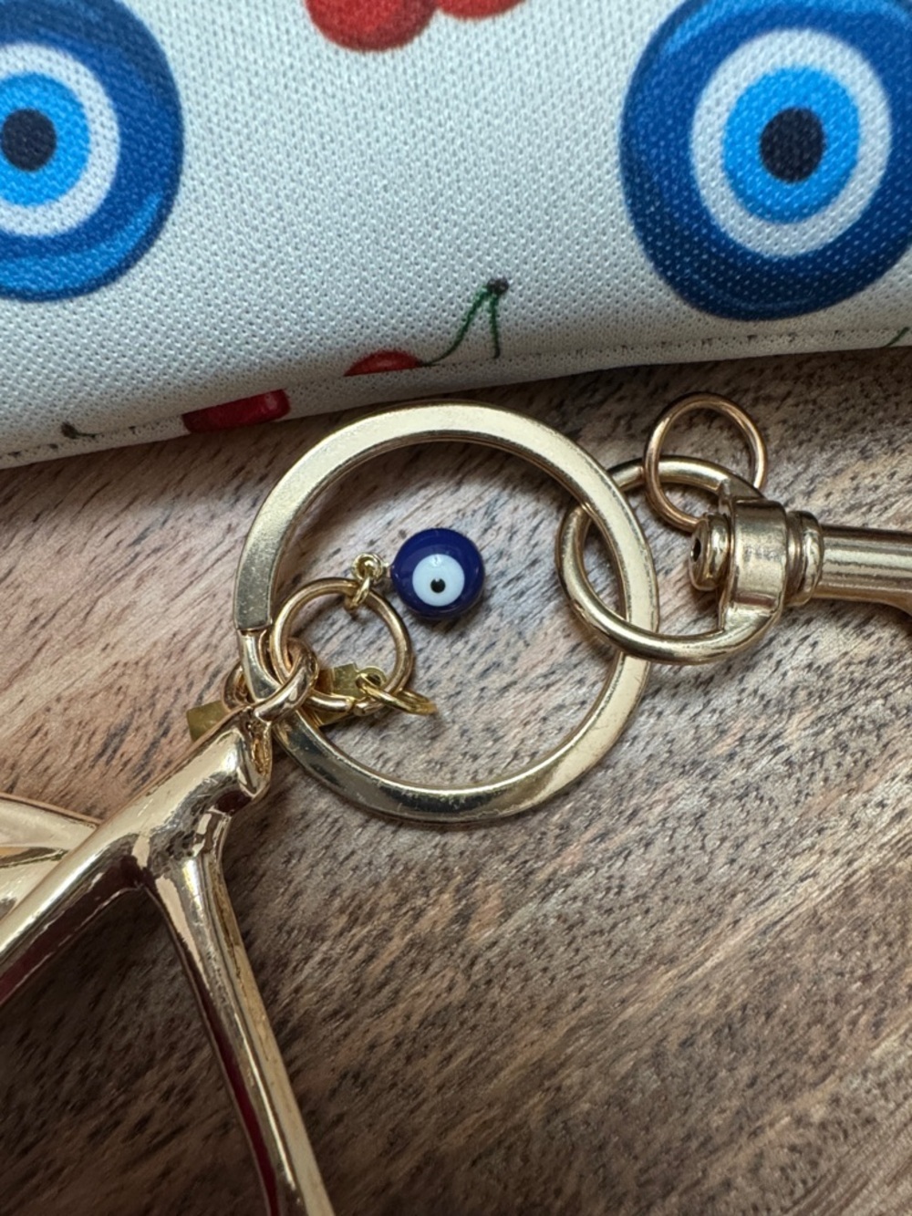 Fashionably Protected Cherry & Evil Eye Wristlet Pouch – Cream - Picture 2 of 9